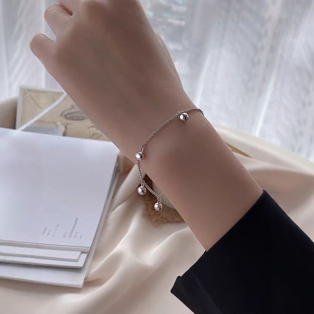 S925 Simple combined with the circular bell pendant design is a fashionable and casual bell pendant chain Bracelet